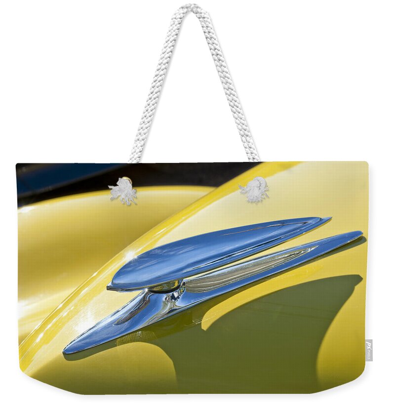 1938 Ford Woody Weekender Tote Bag featuring the photograph 1938 Ford Woody Hood Ornament by Jill Reger
