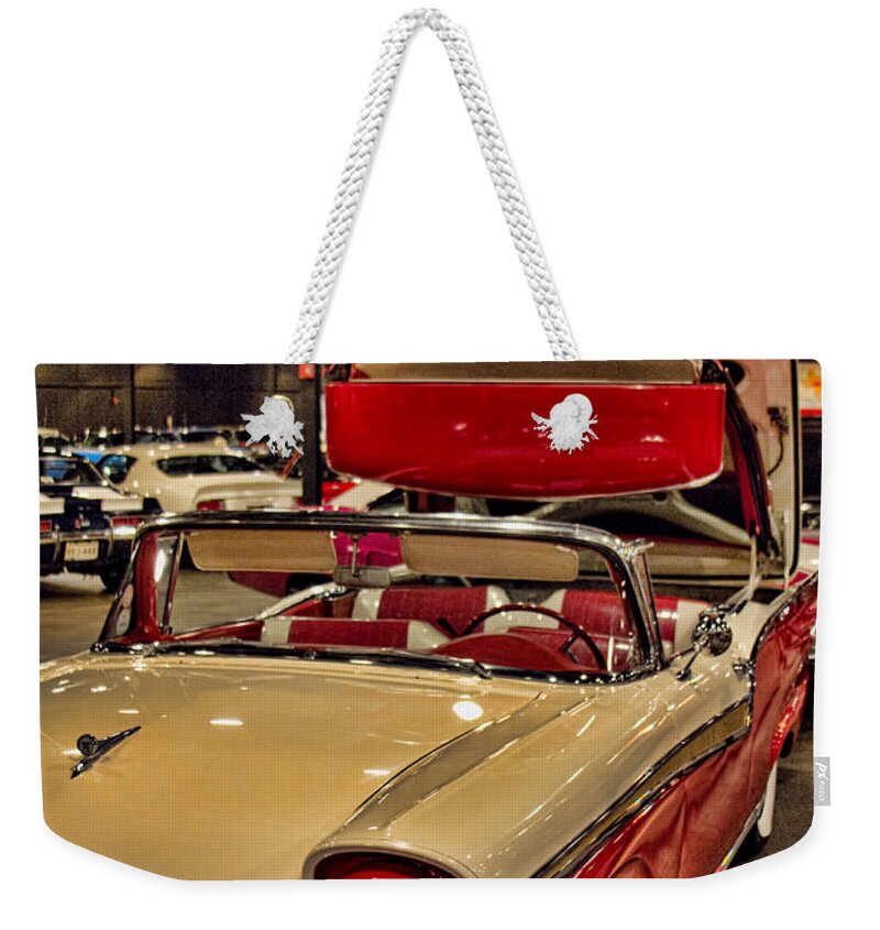 1957 Weekender Tote Bag featuring the photograph 1957 Ford Fairlane Retractable Hardtop Lucy by Douglas Barnard