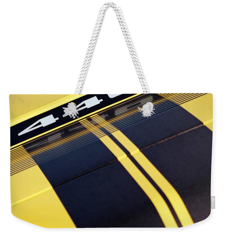 Plymouth Weekender Tote Bag featuring the photograph 1971 Plymouth GTX 440 by Gordon Dean II