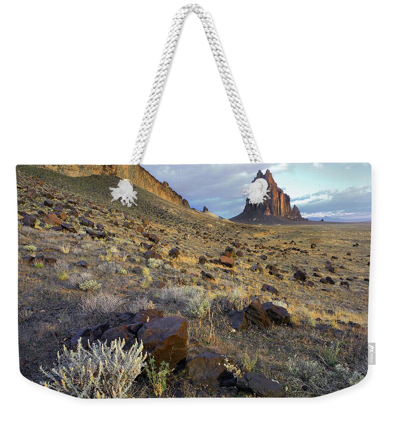 00175117 Weekender Tote Bag featuring the photograph Shiprock The Basalt Core Of An Extinct #2 by Tim Fitzharris