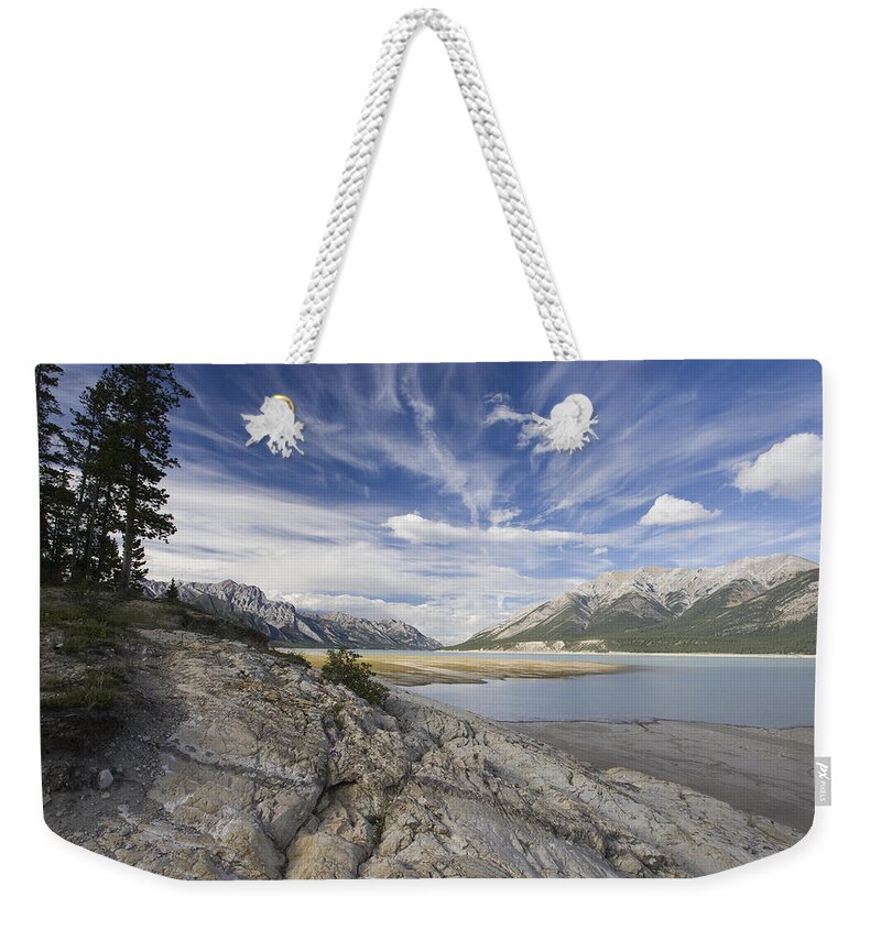 Mp Weekender Tote Bag featuring the photograph Abraham Lake Created By Bighorn Dam by Matthias Breiter