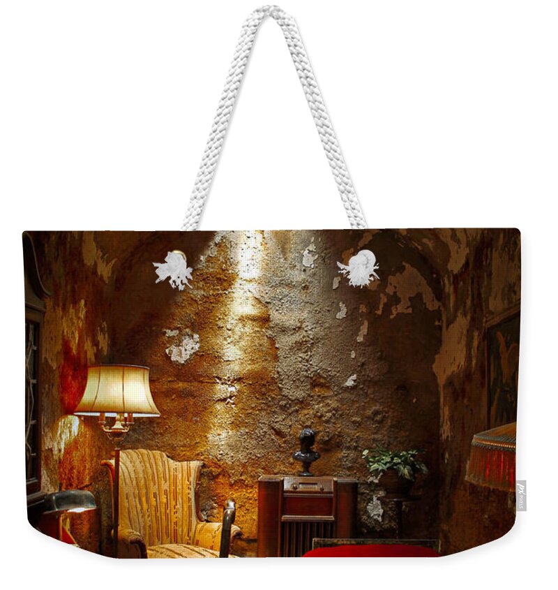 Eastern State Penitentiary Weekender Tote Bag featuring the photograph Al Capones Cell by Brenda Giasson