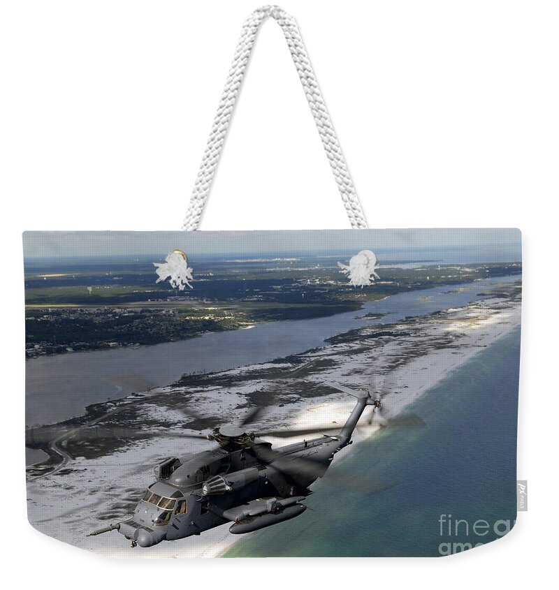 Aerial View Weekender Tote Bag featuring the photograph An Mh-53 Pave Low Flies by Stocktrek Images