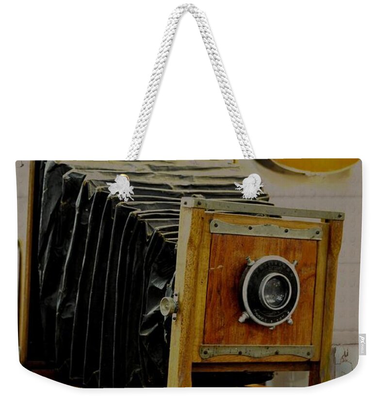 Antiques Weekender Tote Bag featuring the photograph Antiquites by Jan Amiss Photography