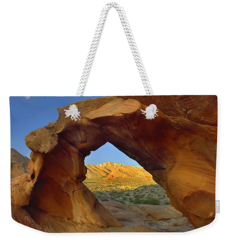 00175130 Weekender Tote Bag featuring the photograph Arch Rock And Moon Valley Of Fire State by Tim Fitzharris