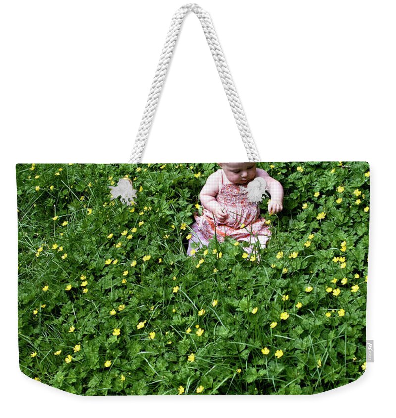 Beautiful Baby Weekender Tote Bag featuring the photograph Baby In a Field of Flowers by Lorraine Devon Wilke