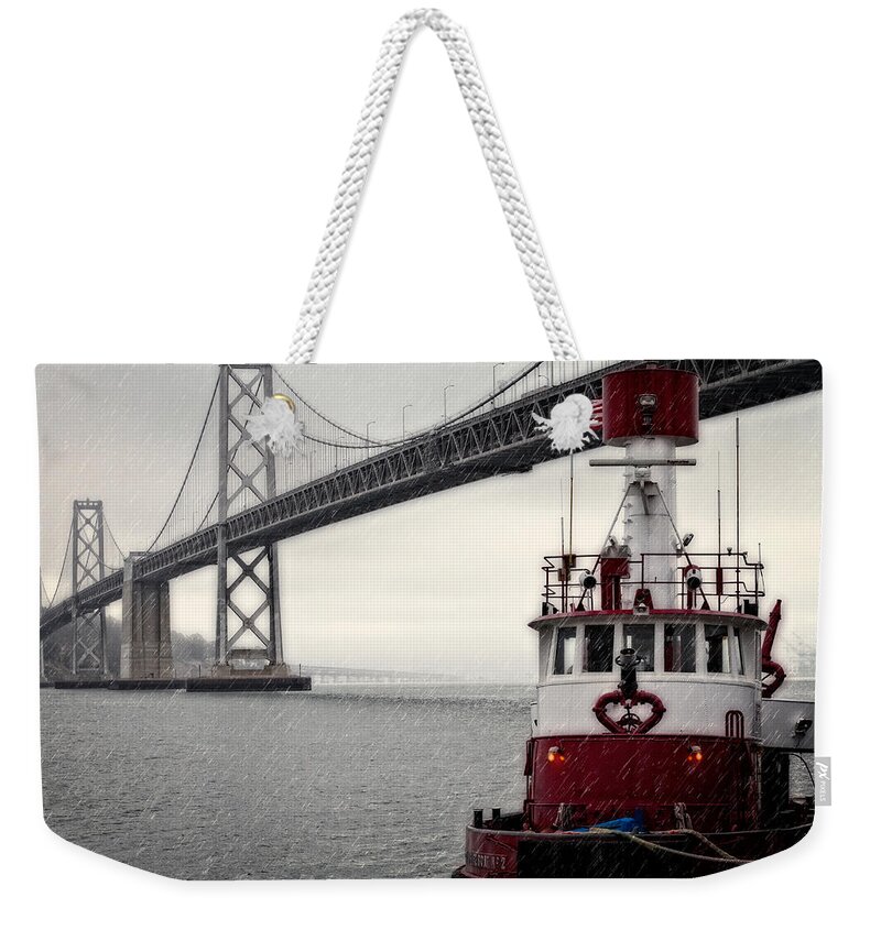 Bridge Weekender Tote Bag featuring the photograph Bay Bridge and Fireboat in the Rain by Jarrod Erbe