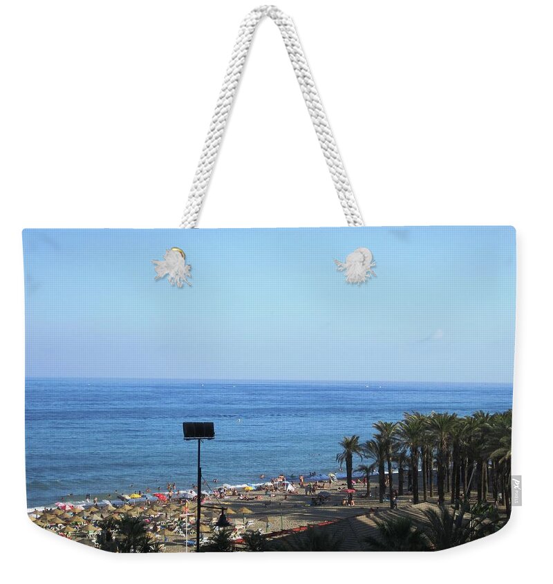 Costa Del Sol Weekender Tote Bag featuring the photograph Beach at Costa Del Sol Spain by John Shiron