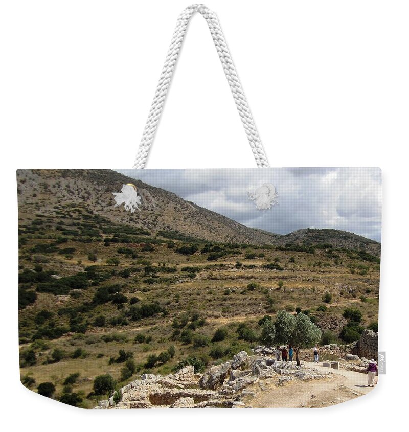 Mycenaean Weekender Tote Bag featuring the photograph Beautiful Mountain Range View of the Ancient Hilltop and Archeological Remains in Mycenae Greece by John Shiron