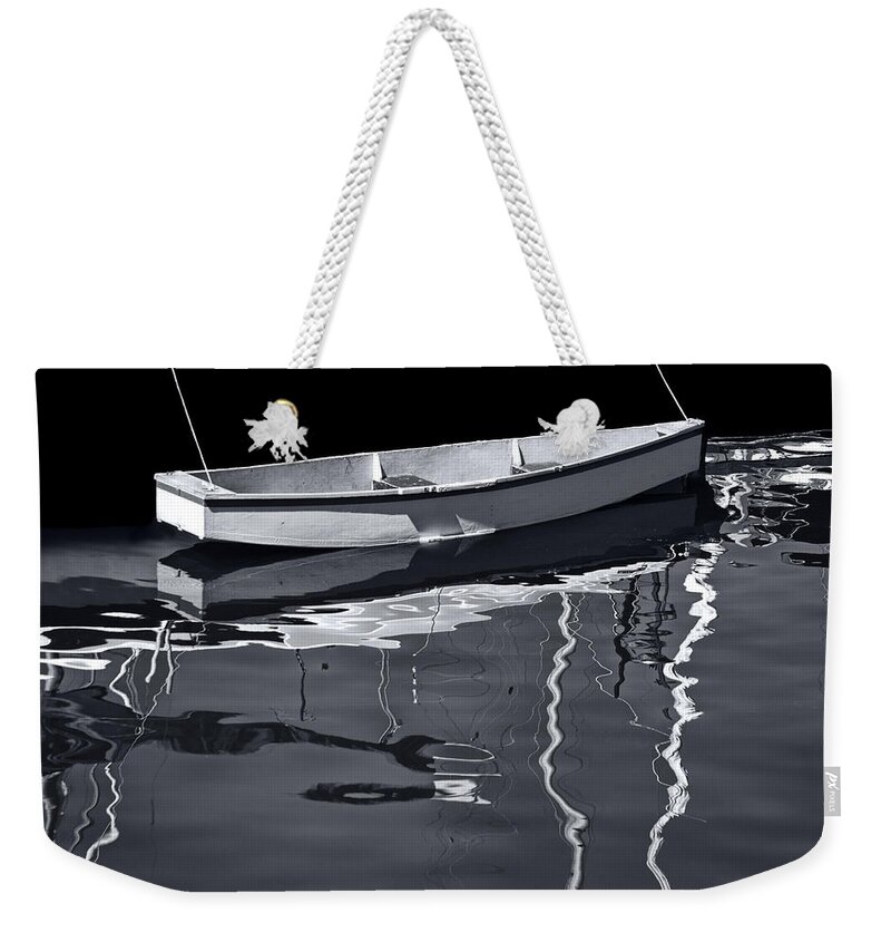 Black And White Weekender Tote Bag featuring the photograph Black and white photograph of a tethered boat in Victoria Harbor by Randall Nyhof