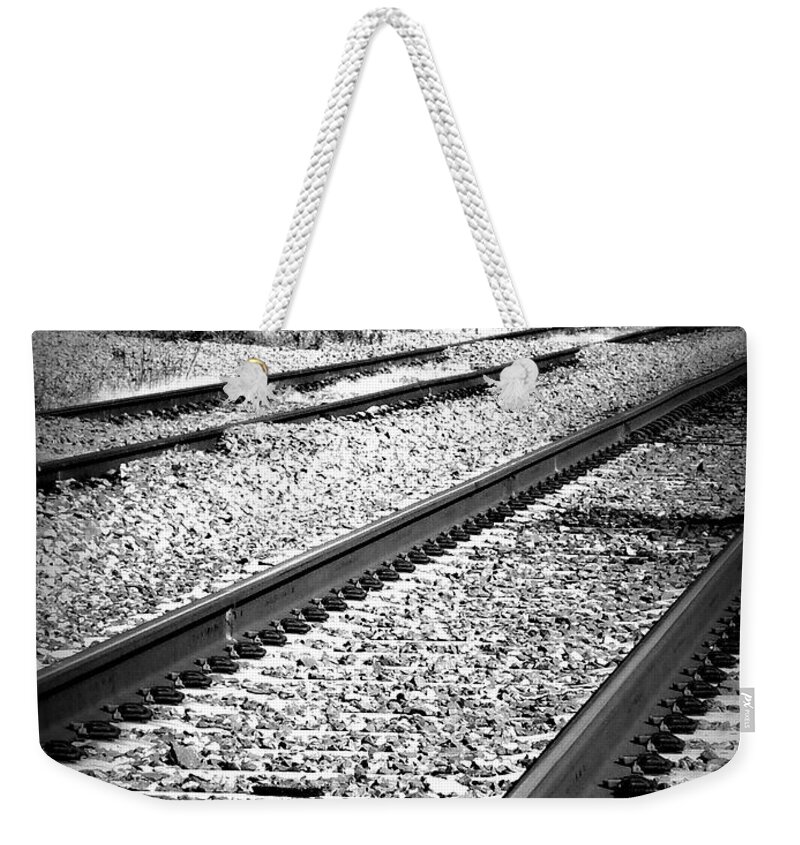 Railroad Weekender Tote Bag featuring the photograph Black and White Railroad Tracks by Kimberly Perry