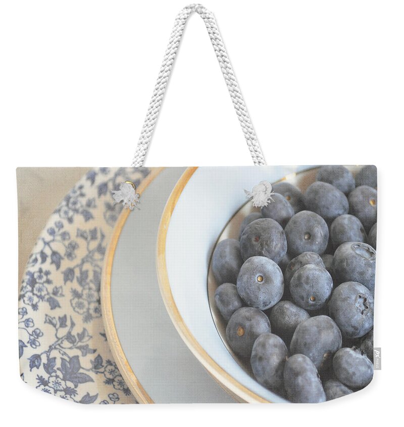 Blueberries Weekender Tote Bag featuring the photograph Blueberries in blue and white china bowl by Lyn Randle