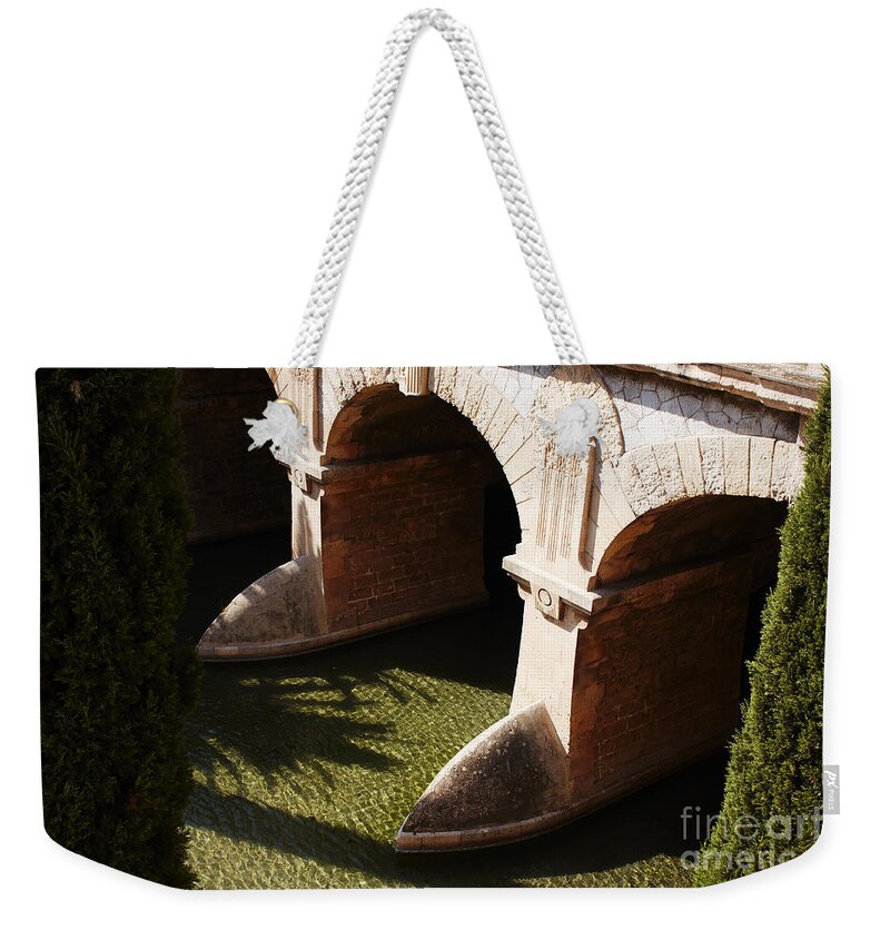 Rio Weekender Tote Bag featuring the photograph Bows in river by Agusti Pardo Rossello