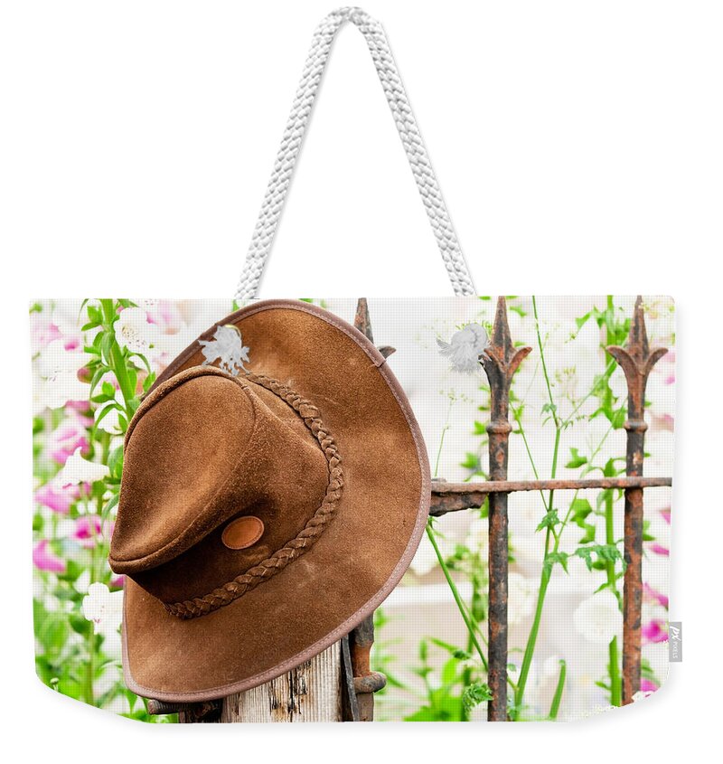 Garden Weekender Tote Bag featuring the photograph Bush hat on railing by Simon Bratt