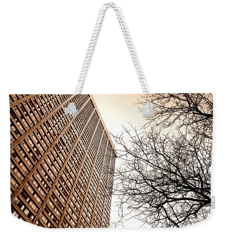City Weekender Tote Bag featuring the photograph City Vs Nature by Valentino Visentini