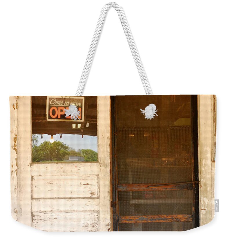 Texas Country Store Weekender Tote Bag featuring the photograph Door to a Country Store by Connie Fox