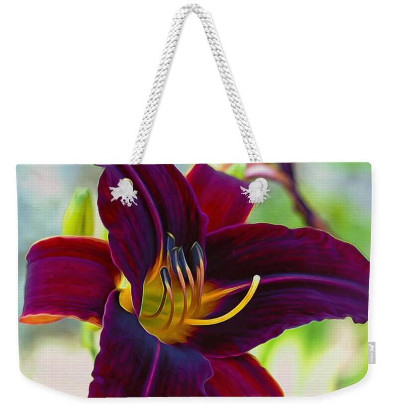 Lily Weekender Tote Bag featuring the photograph Electric Maroon Lily by Bill and Linda Tiepelman