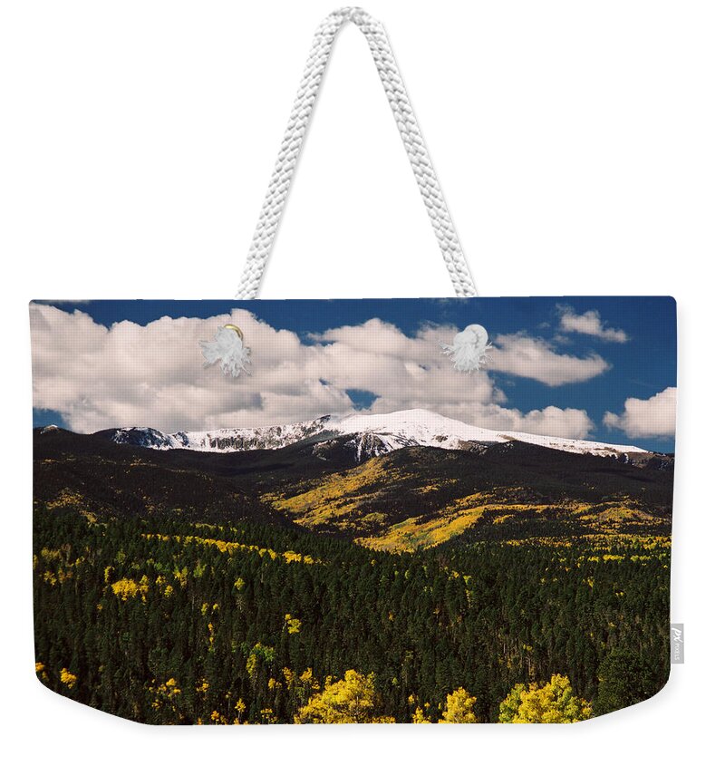 Red River Weekender Tote Bag featuring the photograph Fall Snow On Gold Hill by Ron Weathers