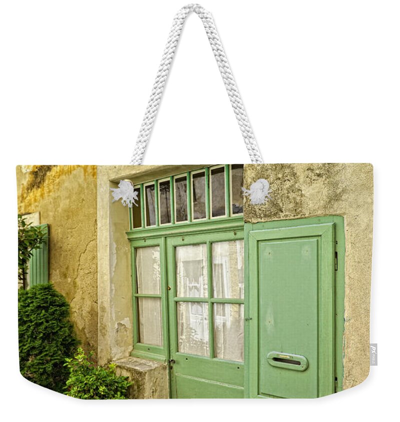 Dog Weekender Tote Bag featuring the photograph Famille de attente dans Gordes by Fred J Lord