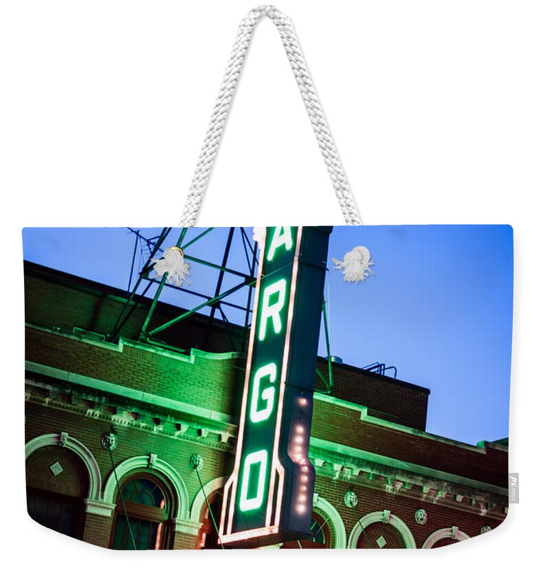 America Weekender Tote Bag featuring the photograph Fargo ND Theatre Marquee at Night Photo by Paul Velgos
