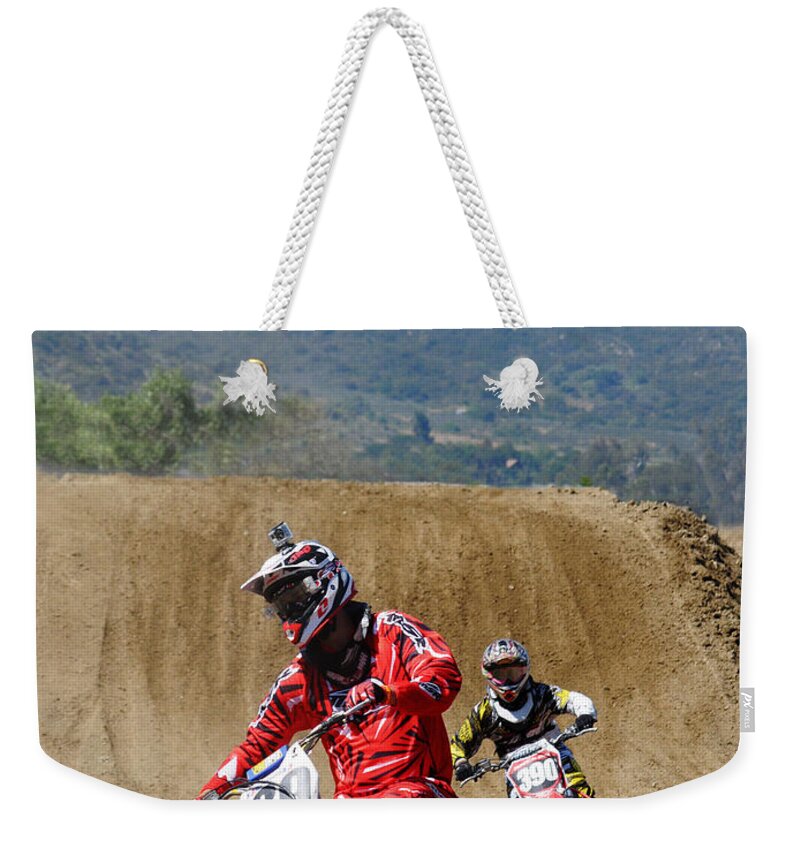 Motocross Weekender Tote Bag featuring the photograph Fast and Furious by Vivian Christopher