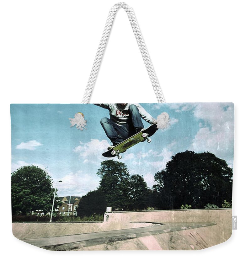 Yhun Suarez Weekender Tote Bag featuring the photograph Fly High by Yhun Suarez