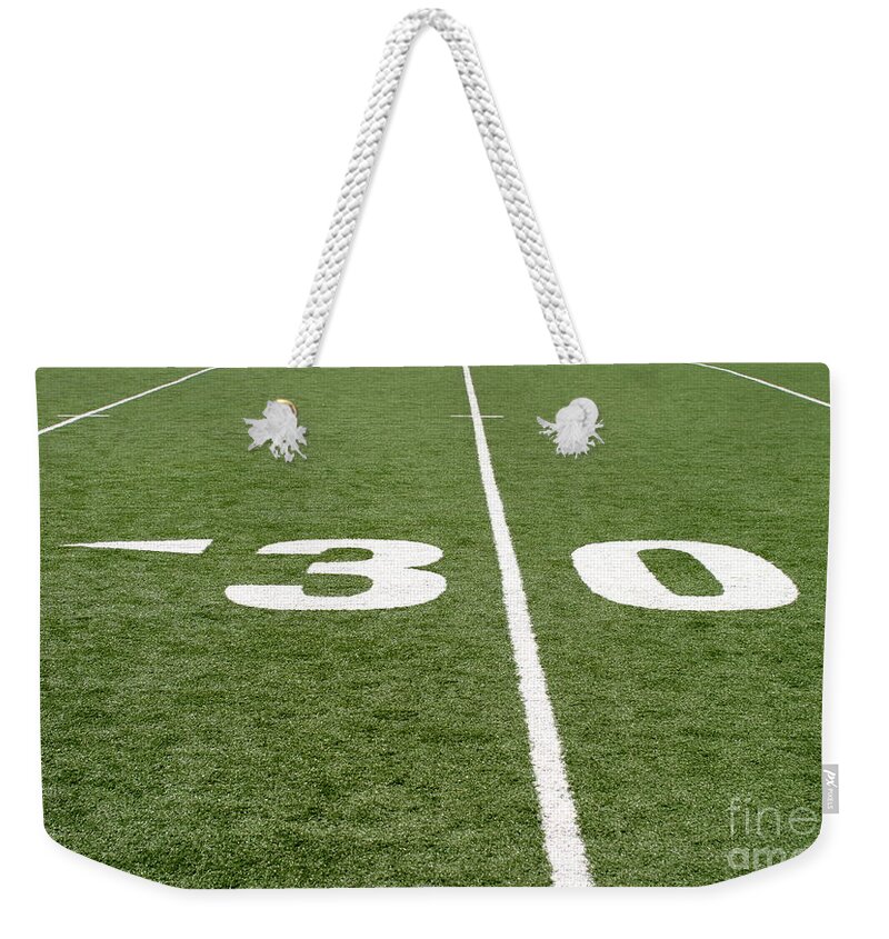 American Weekender Tote Bag featuring the photograph Football Field Thirty by Henrik Lehnerer