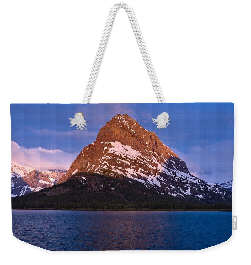 Many Glacier Weekender Tote Bag featuring the photograph Grinnel Point at First Light by Greg Nyquist