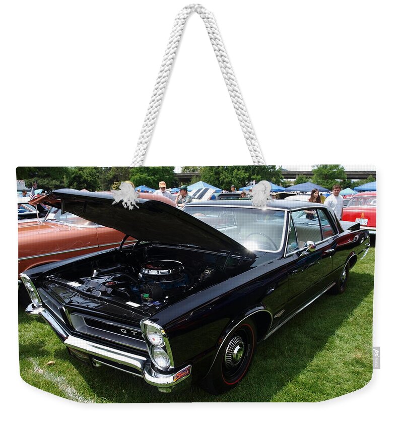 Car Weekender Tote Bag featuring the photograph GTO by Teri Schuster