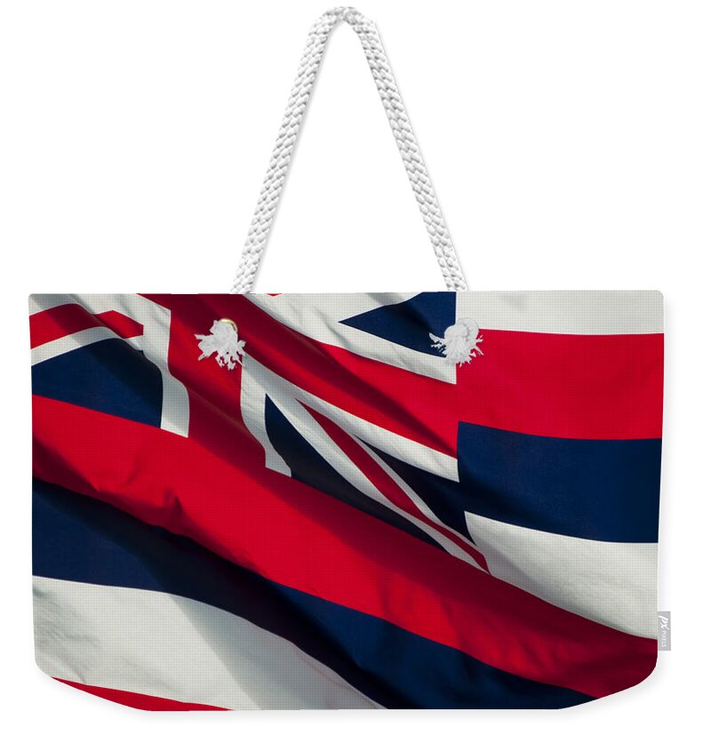 Blue Weekender Tote Bag featuring the photograph Hawaiian State Flag by Joe Carini - Printscapes