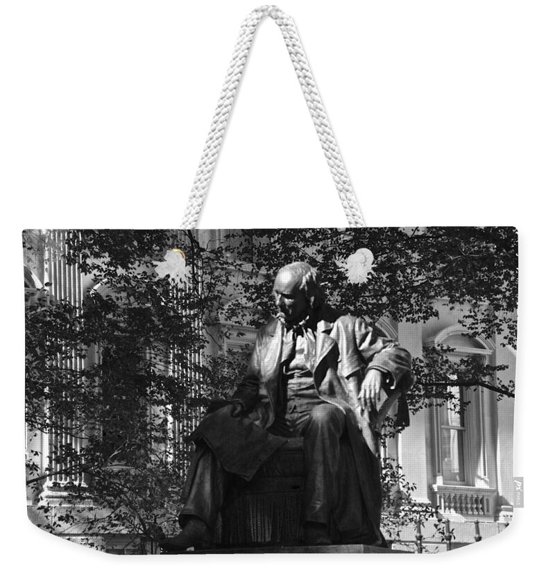 New York Weekender Tote Bag featuring the photograph Horace Greeley by Eric Tressler