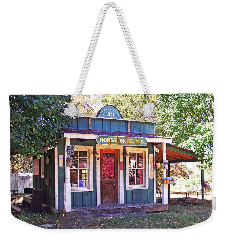 Horse Shoe Weekender Tote Bag featuring the photograph Horse Shoe Store NC by Duane McCullough