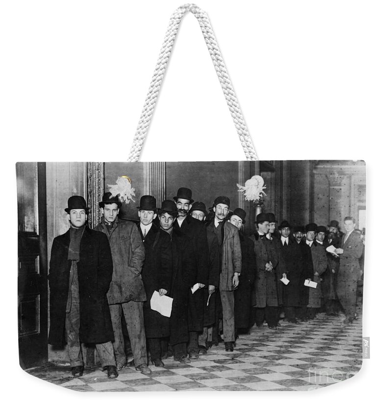 Immigration Weekender Tote Bag featuring the photograph Immigrants Waiting In Line by Photo Researchers