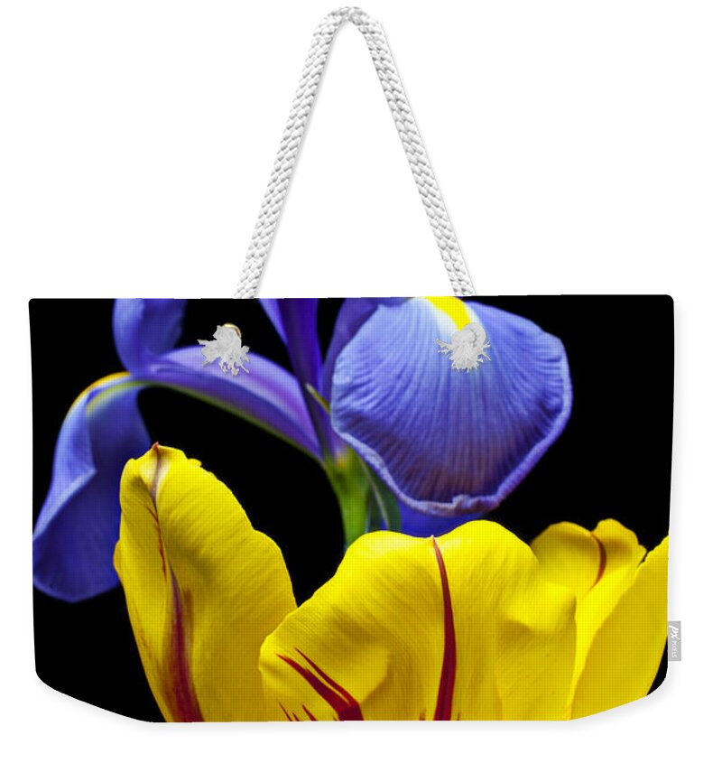 Yellow Weekender Tote Bag featuring the photograph Iris and tulip by Garry Gay