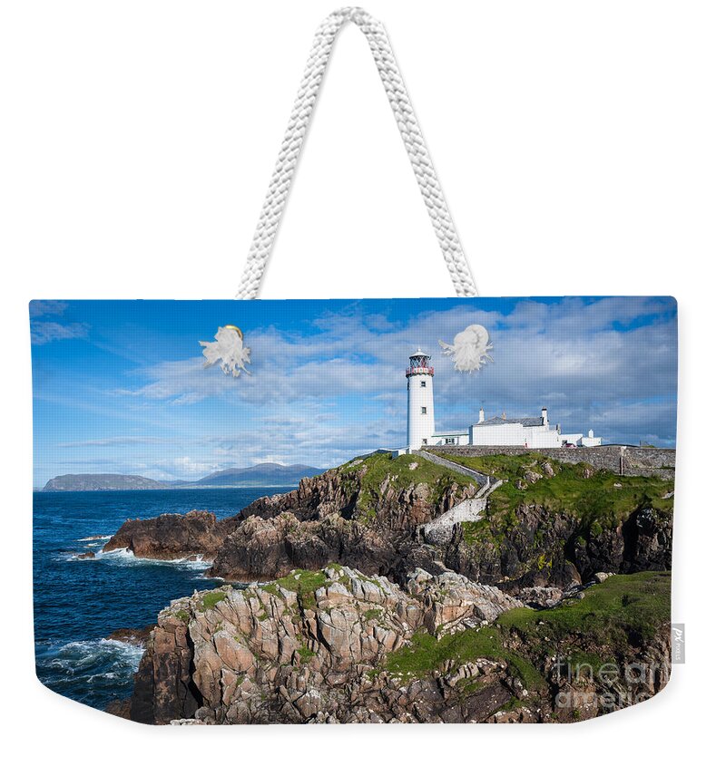 Lighthouse Weekender Tote Bag featuring the photograph Irish Lighthouse by Andrew Michael