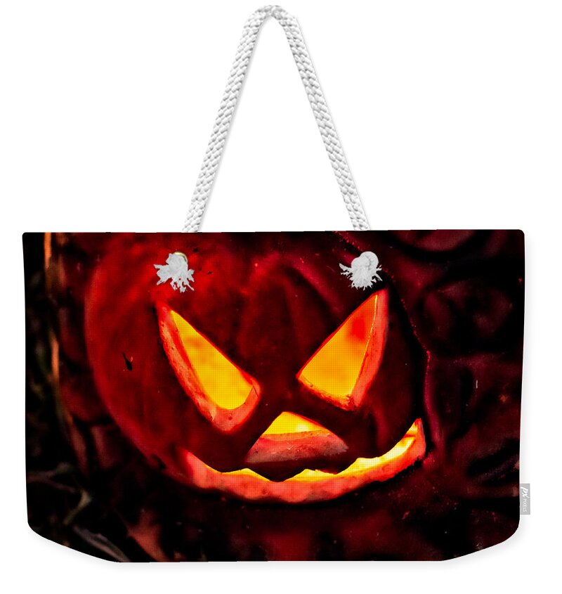 Halloween Weekender Tote Bag featuring the photograph Jack-O-Lantern by Christopher Holmes