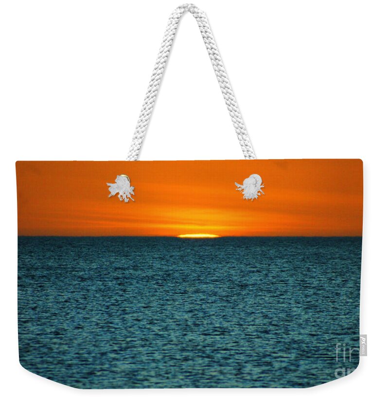 Sunset Weekender Tote Bag featuring the photograph Just A Sliver by Anthony Wilkening