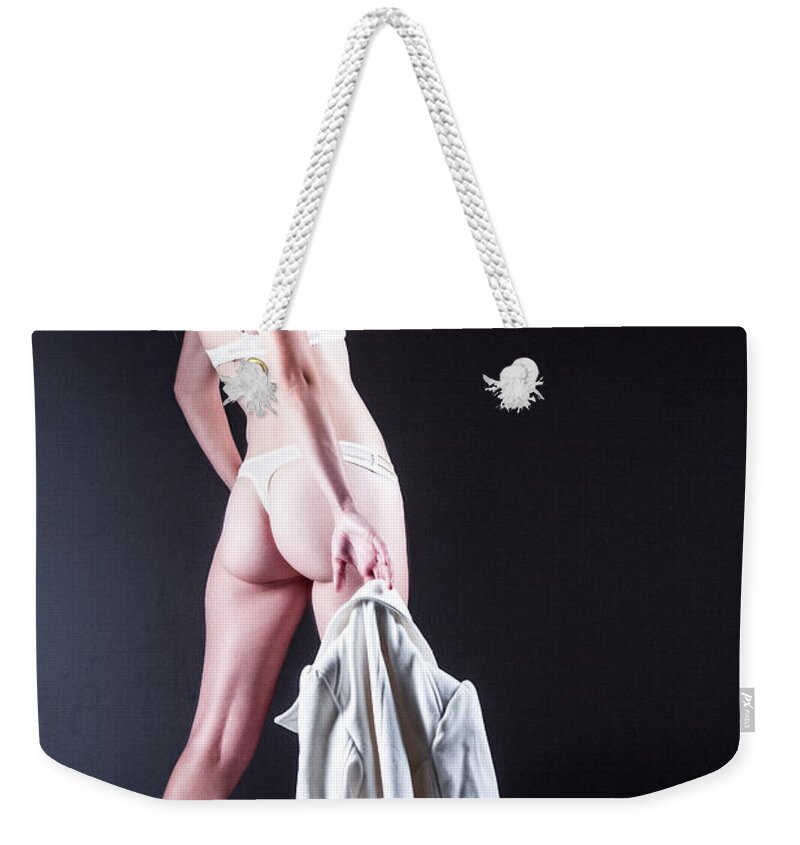 Ralf Weekender Tote Bag featuring the photograph Lady With A Coat by Ralf Kaiser