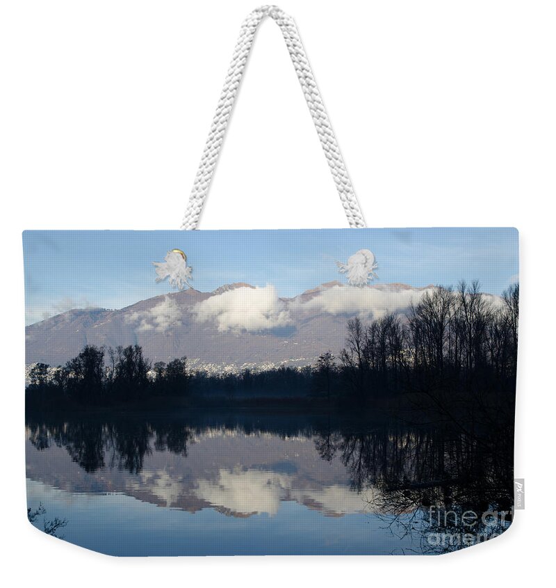 Lake Weekender Tote Bag featuring the photograph Lake with mountain by Mats Silvan