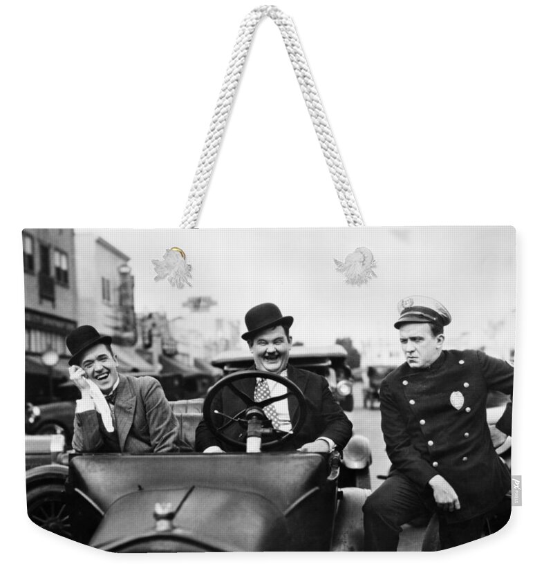 1920s Weekender Tote Bag featuring the photograph Laurel And Hardy, 1928 by Granger