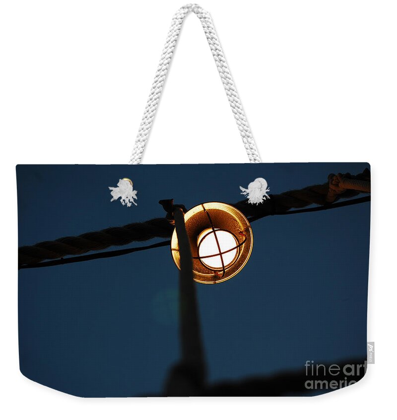 Light Weekender Tote Bag featuring the photograph Lightrope by Robert Meanor