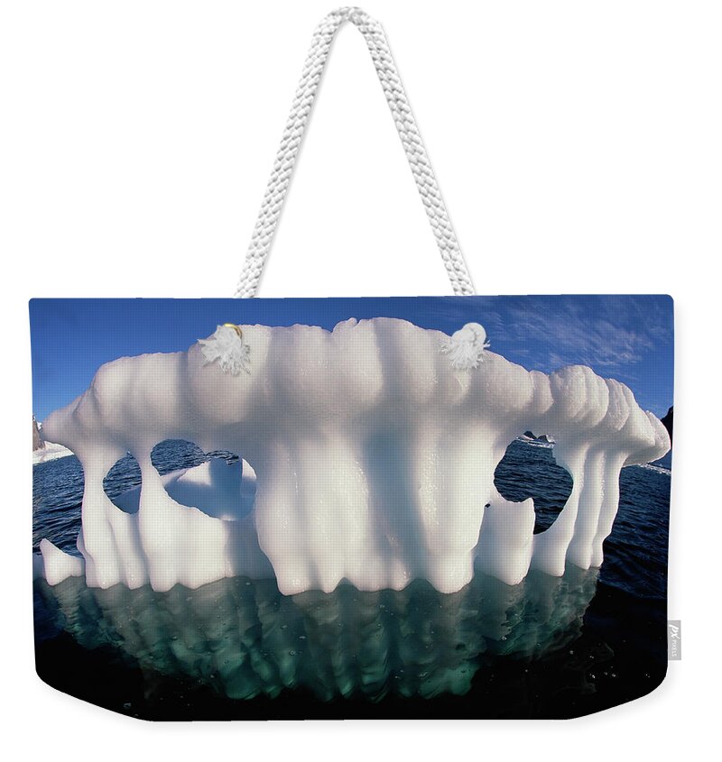 Hhh Weekender Tote Bag featuring the photograph Melting Shard Of An Iceberg, Bergy Bit by Colin Monteath