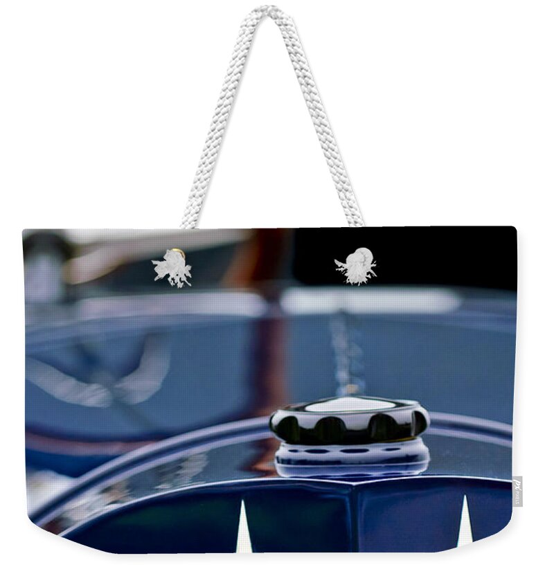 Mercedes-benz Weekender Tote Bag featuring the photograph Mercedes-Benz Grille by Jill Reger