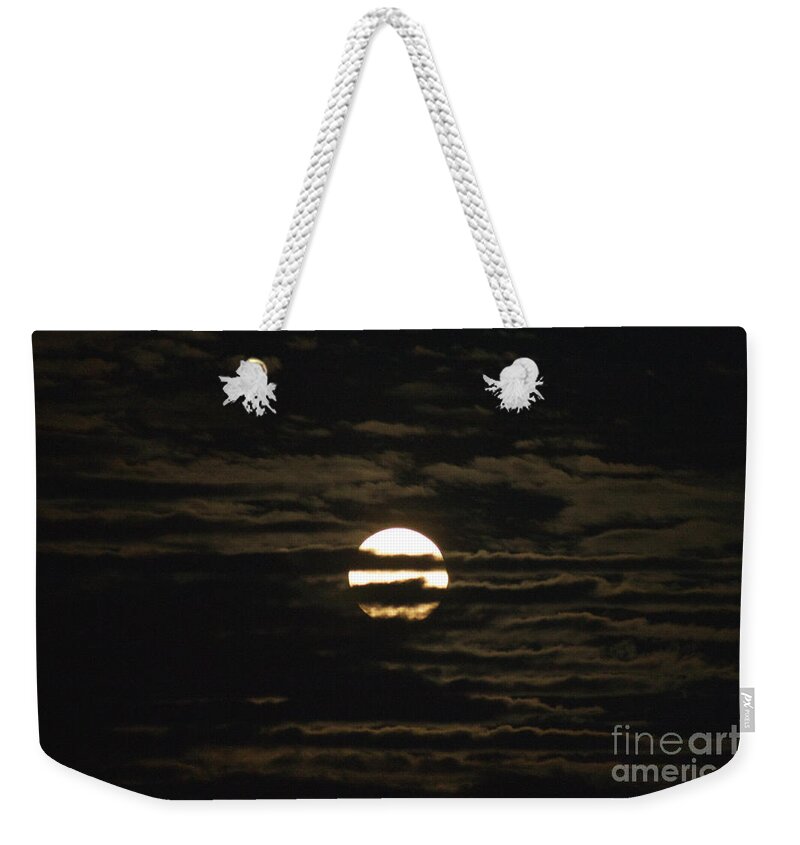 Moon Weekender Tote Bag featuring the photograph Moon behind the Clouds by William Norton