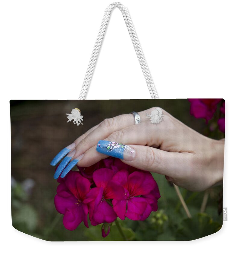Landscape Weekender Tote Bag featuring the photograph Nails and Geranium by Donna L Munro