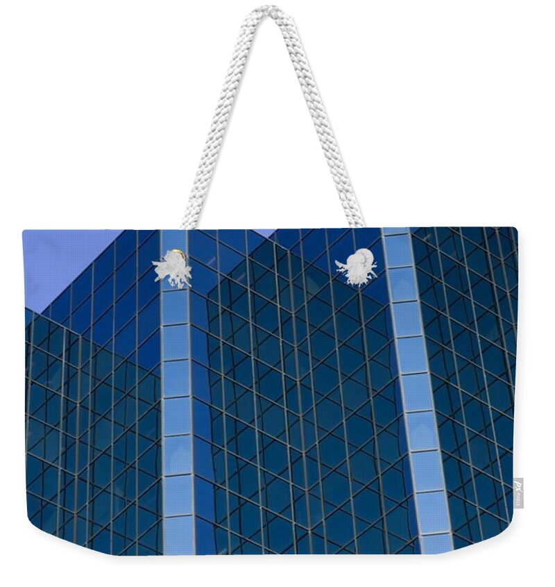 Architectural Detail Weekender Tote Bag featuring the photograph Office Buildings by David Chapman