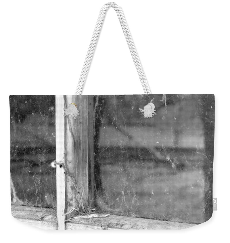 Black&white Weekender Tote Bag featuring the photograph Old Window Reflection by Sandra Bronstein