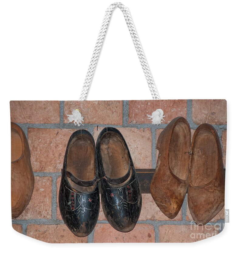 Amsterdam Weekender Tote Bag featuring the digital art Old Wooden Shoes by Carol Ailles