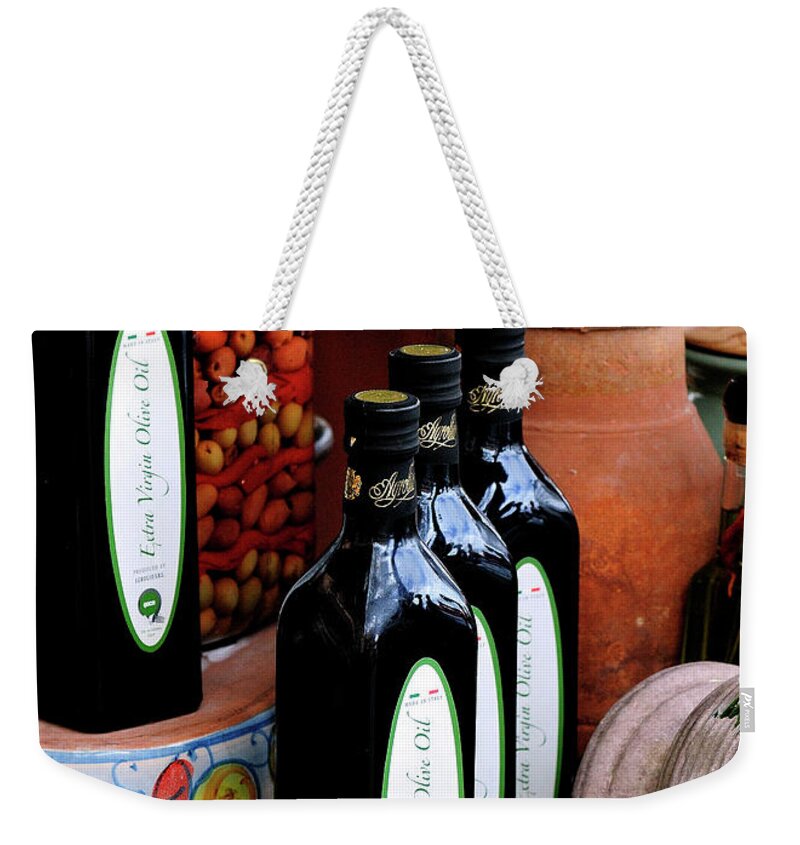 Still Weekender Tote Bag featuring the photograph Olives and Olive Oil by Bill Dodsworth