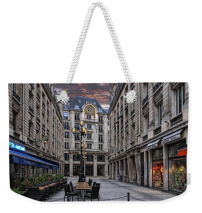 Paris Weekender Tote Bag featuring the photograph on an early sunday morning in Paris by Joachim G Pinkawa